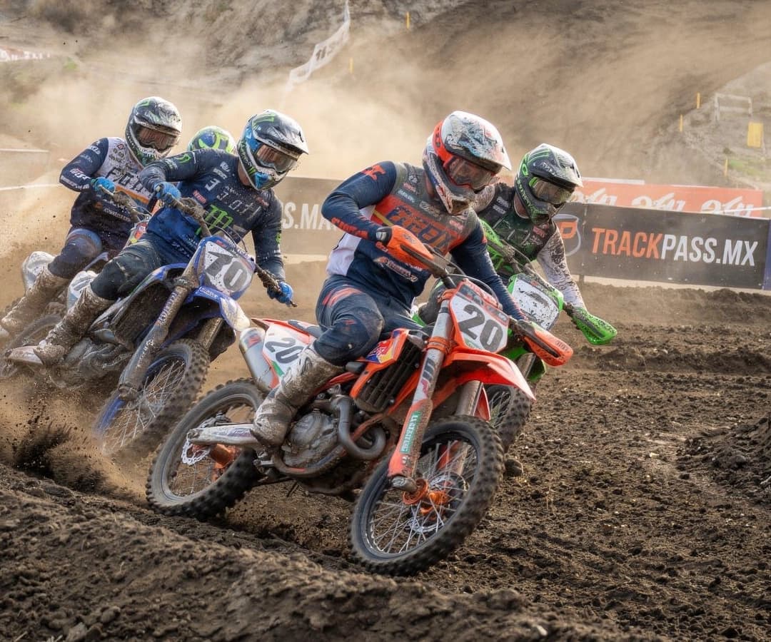 Riders leaning through a turn